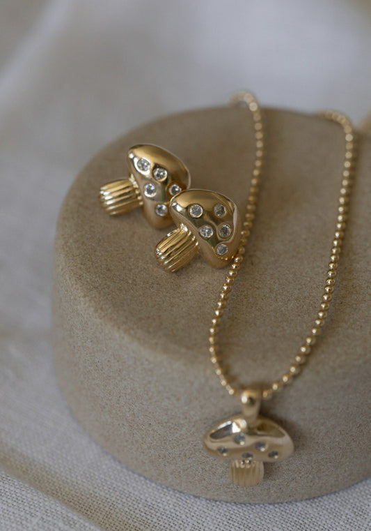 Brinco cogumelo dourado