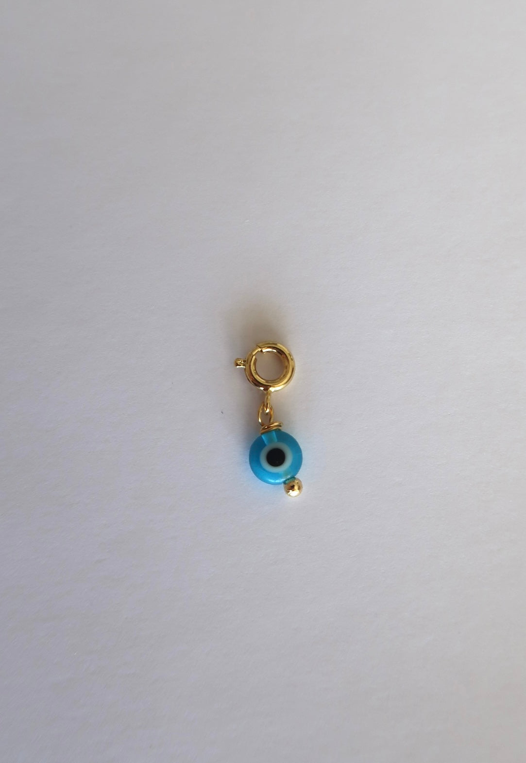 Pingente olho grego azul
