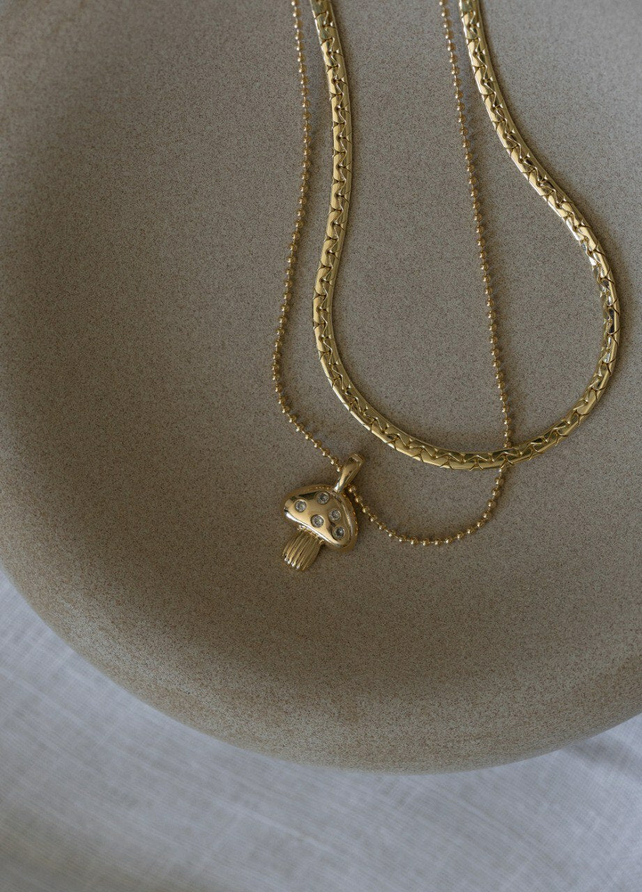 Colar cogumelo dourado
